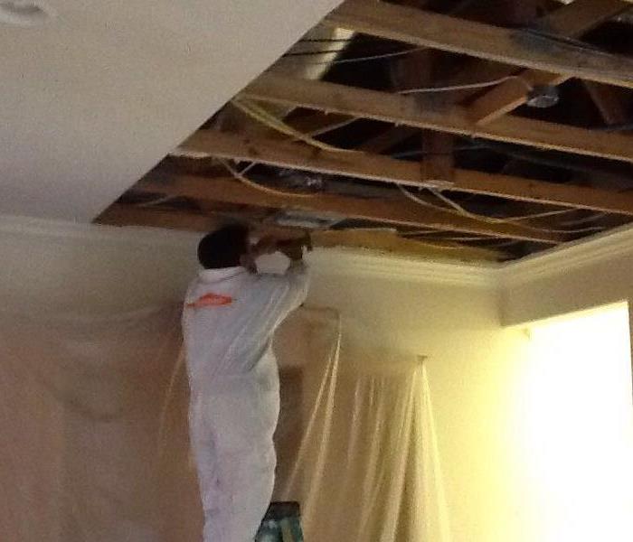Hurricane Michael removing the damaged ceiling